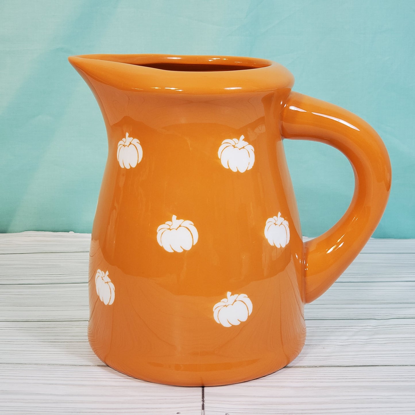 Terramotto Ceramic 40 oz Dark Orange Fall Pitcher with White Pumpkin Motif