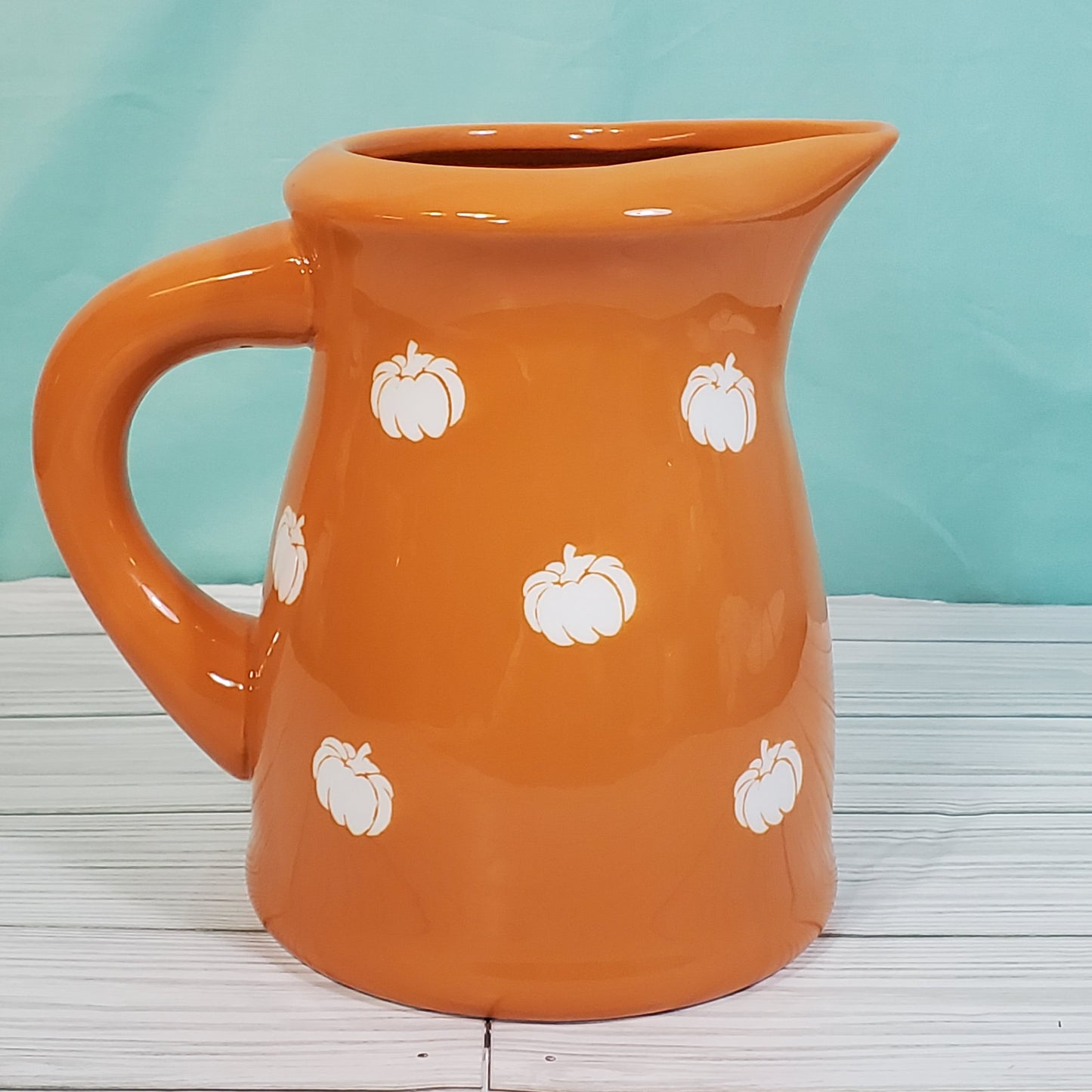 Terramotto Ceramic 40 oz Dark Orange Fall Pitcher with White Pumpkin Motif